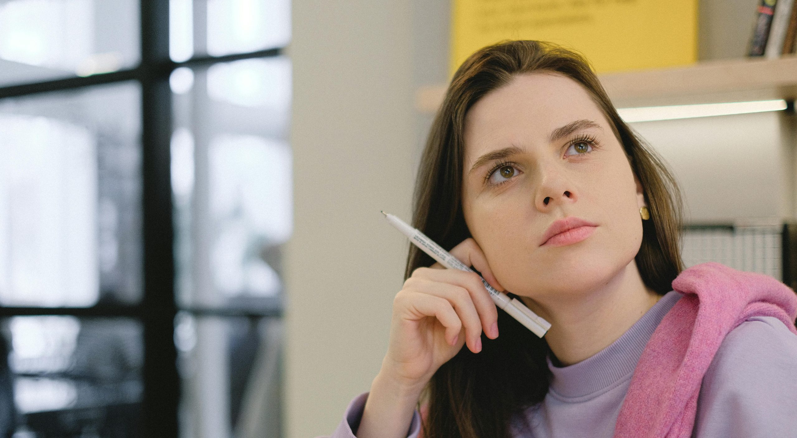 Woman considering what she should know about abortion pills, including how they work and their risks.